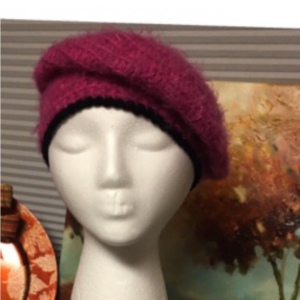 Handcrafted bright pink beret with black accents